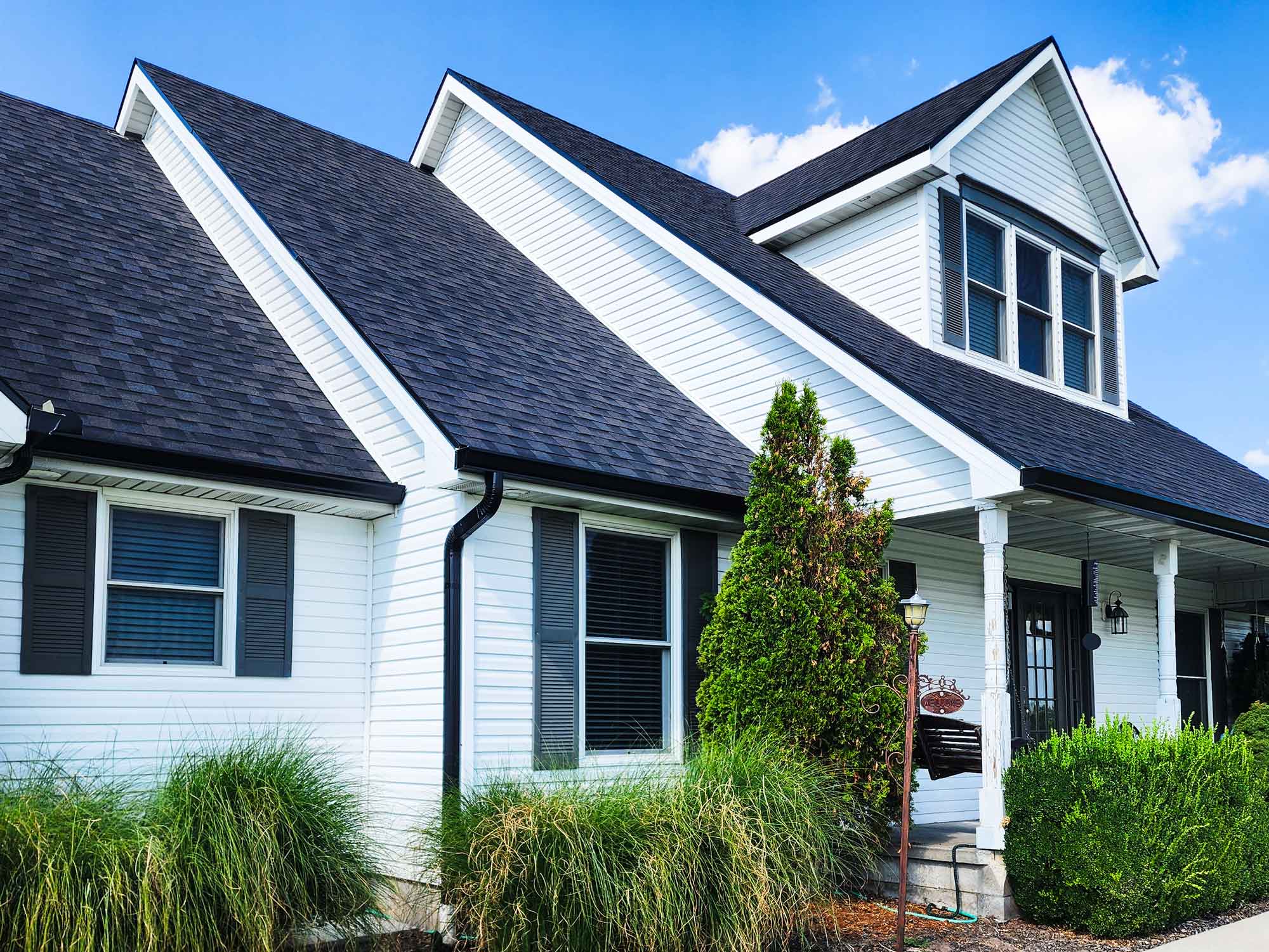 Image of home, specifically showcasing gutter work