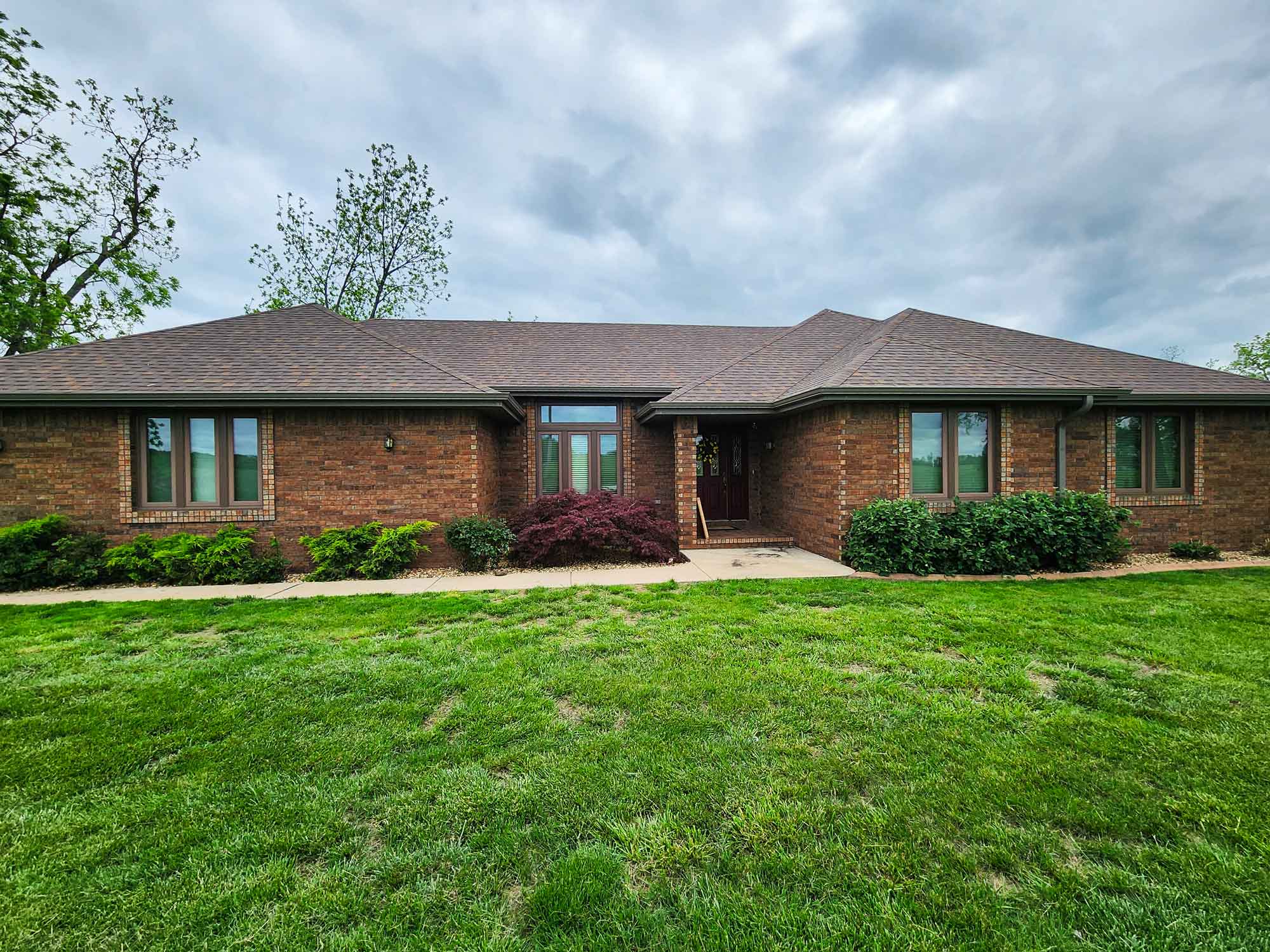 Image of home, specifically showcasing gutter work