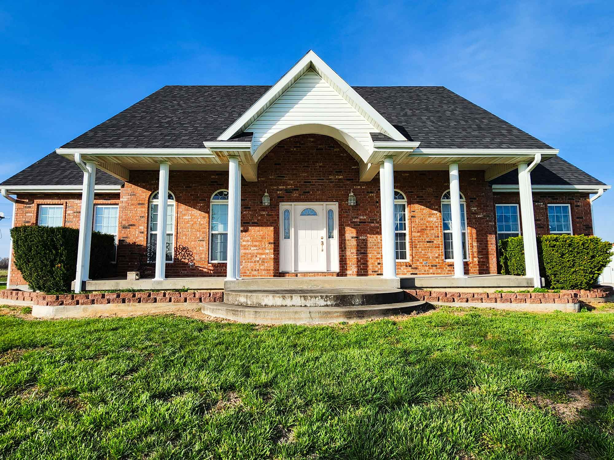 Image of home, specifically showcasing gutter work