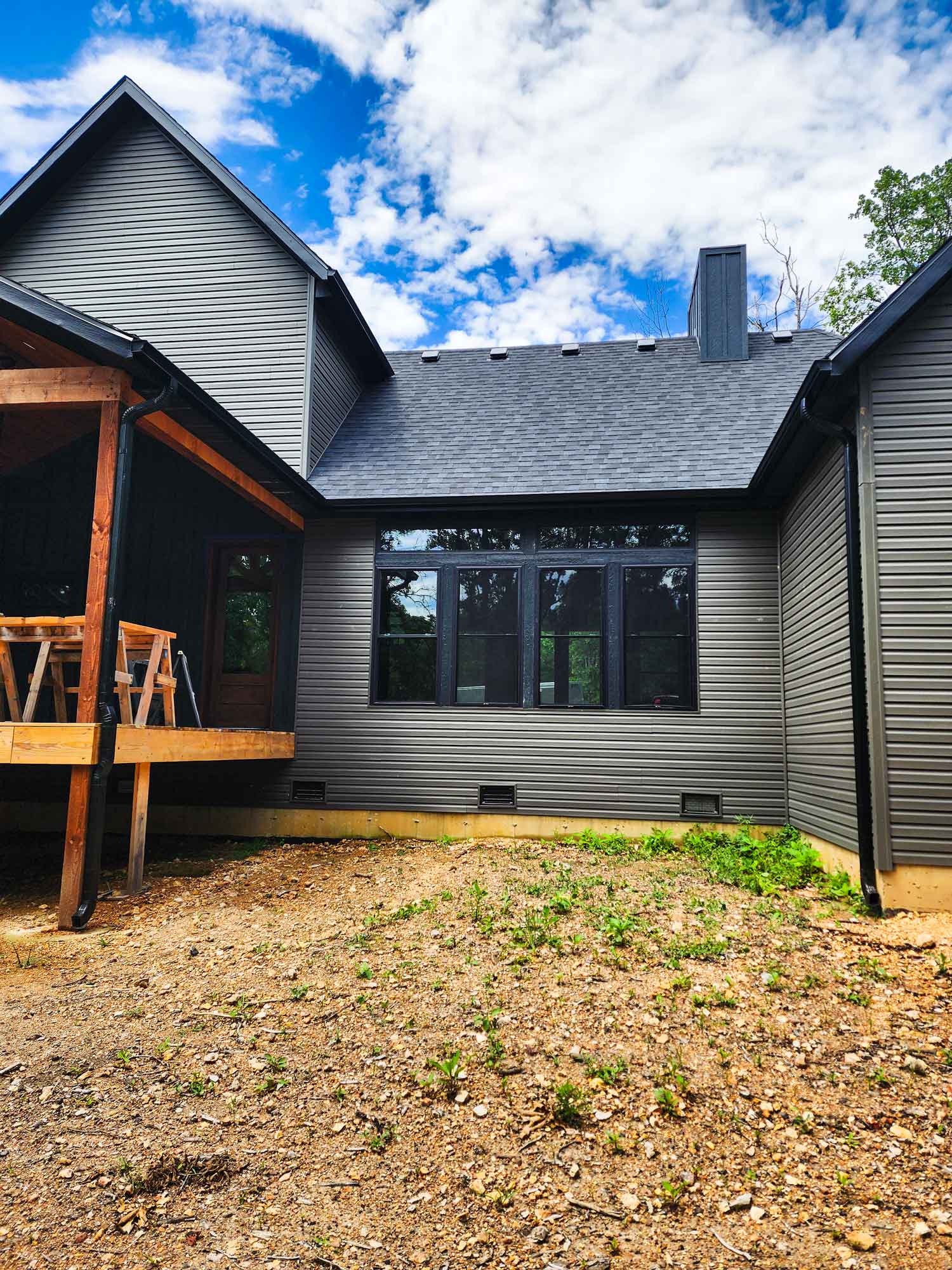 Image of home, specifically showcasing gutter work