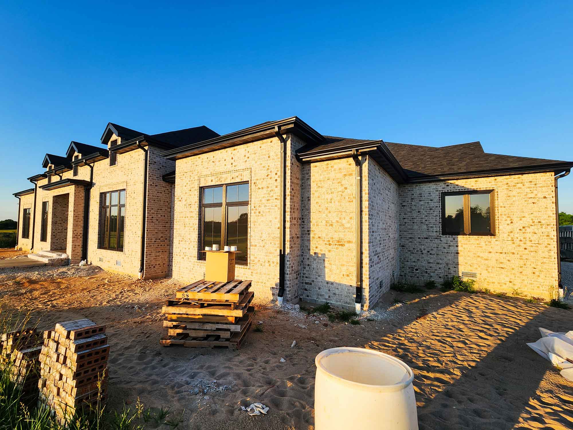 Image of home, specifically showcasing gutter work