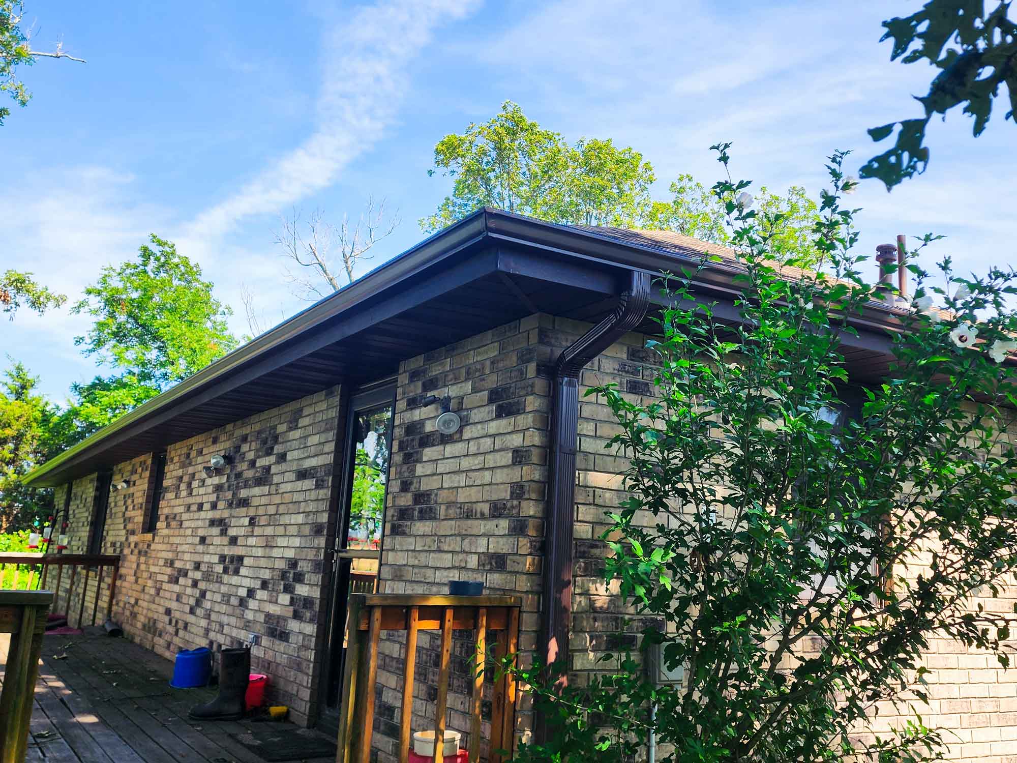 Image of home, specifically showcasing gutter work