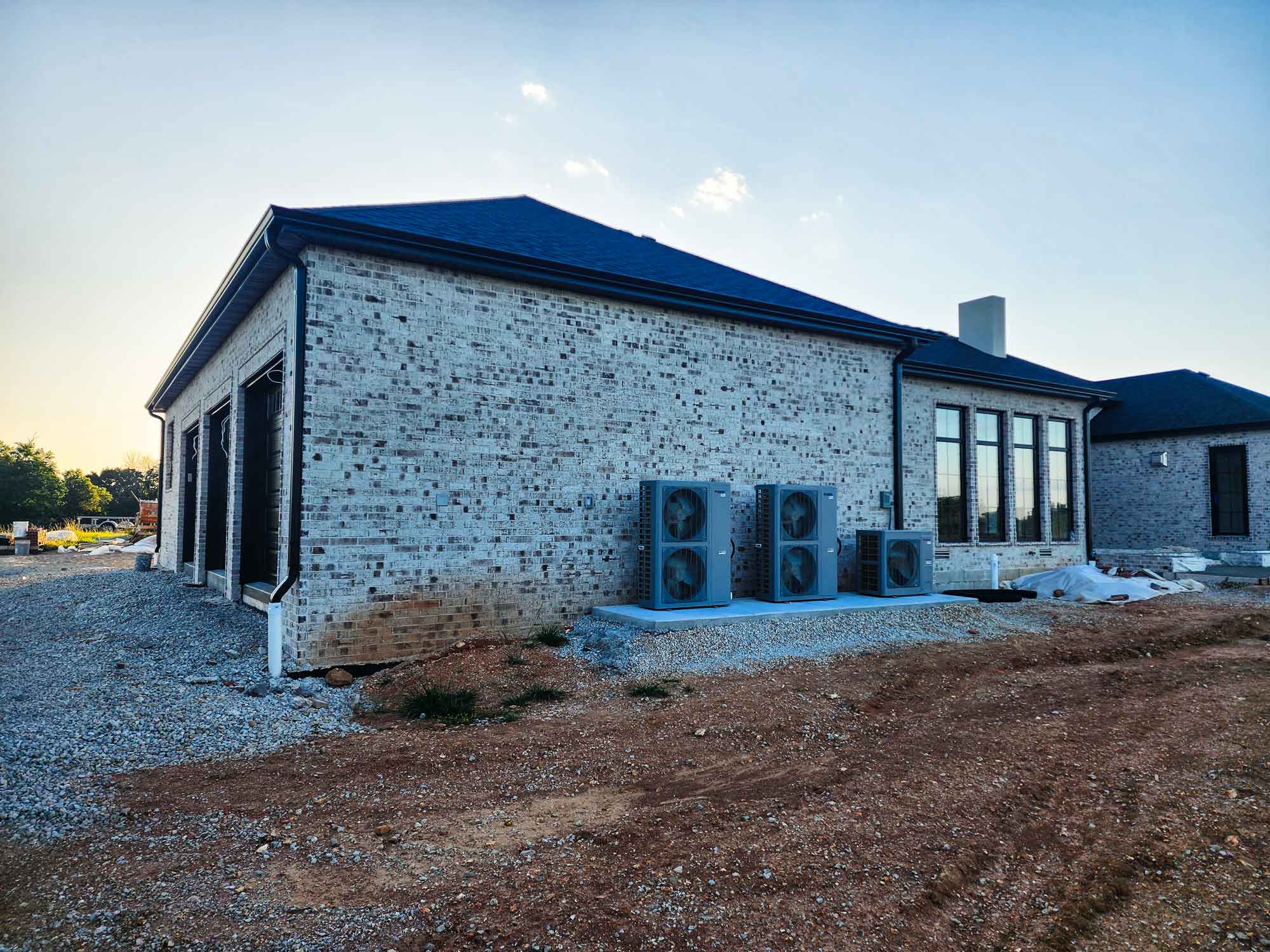 Image of home, specifically showcasing gutter work