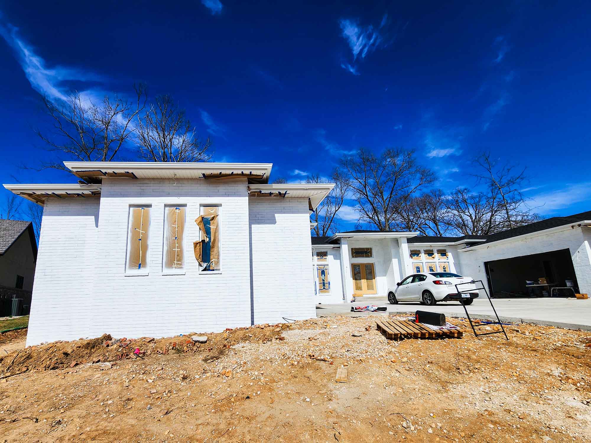 Image of home, specifically showcasing gutter work