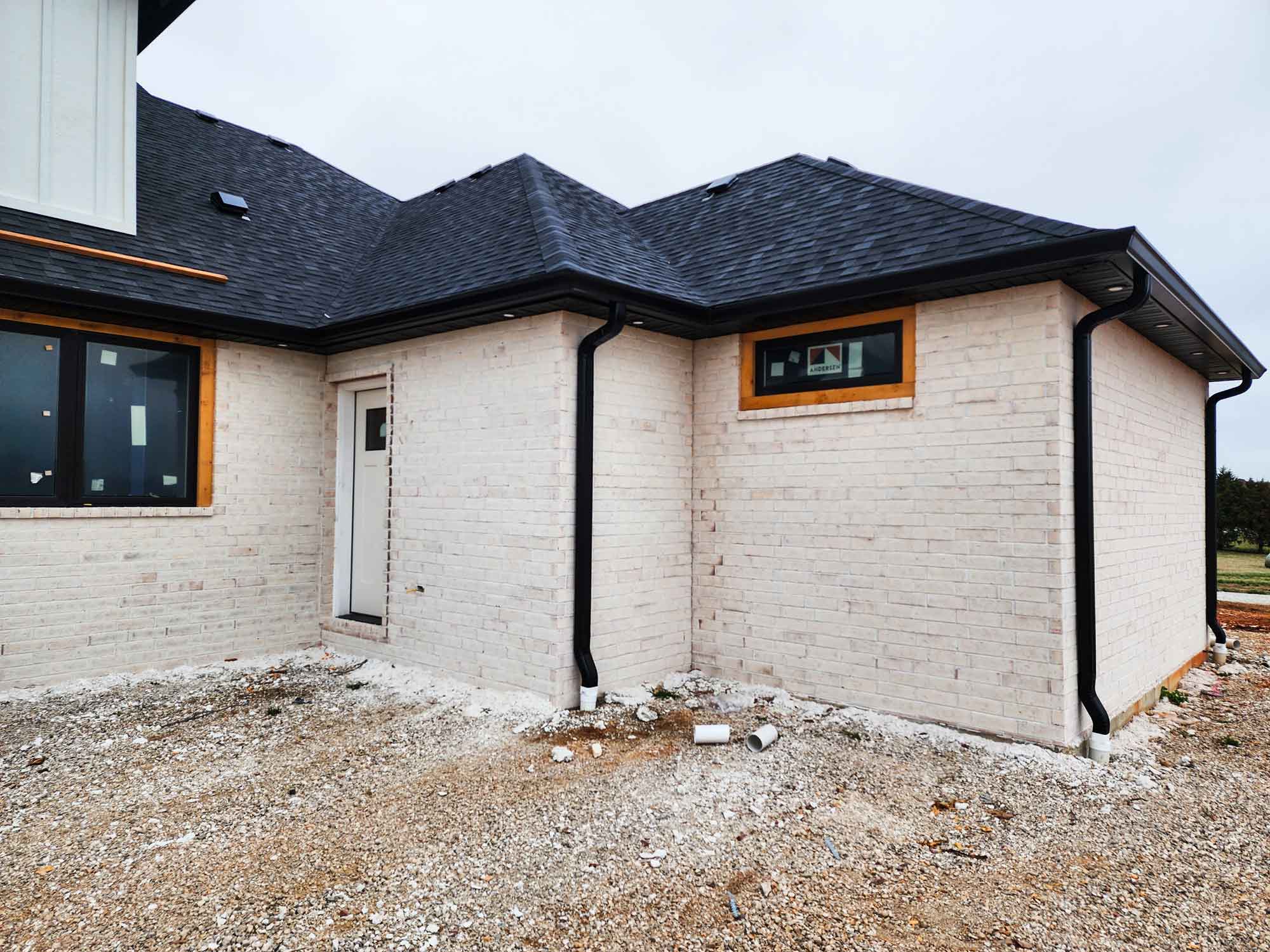 Image of home, specifically showcasing gutter work